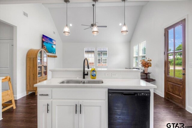 509 Zimmerman Dr, Jacksonville, TX 75766 - kitchen with dark wood-type flooring, light countertops, white cabinetry, a sink, and dishwasher