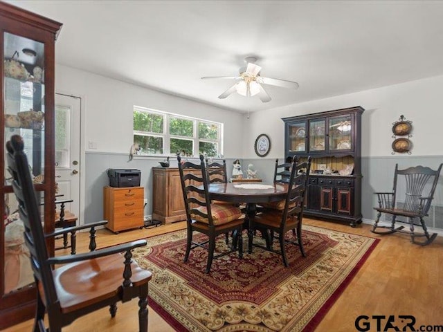 415 Lakeshore Dr, Palestine, TX 75801 - dining area with light wood finished floors and a ceiling fan