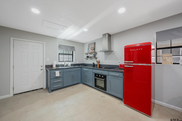 kitchen featuring recessed lighting, wall chimney range hood, black appliances, and dark countertops