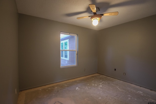 21298 Dogwood Dr, Flint, TX 75762 - spare room featuring ceiling fan, baseboards, and concrete floors