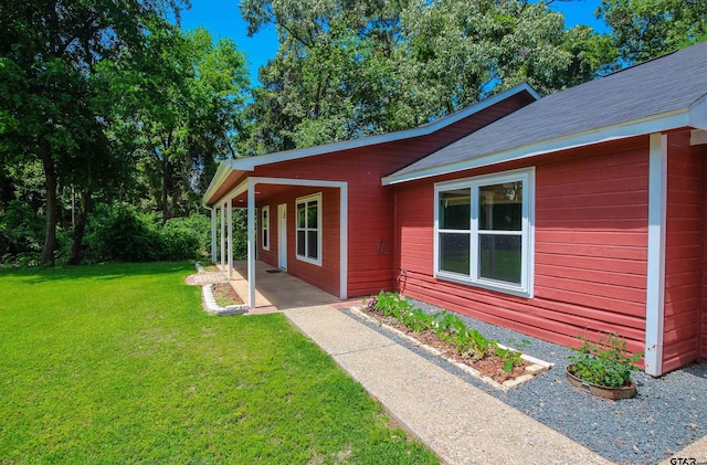 21298 Dogwood Dr, Flint, TX 75762 - view of front of house featuring a front lawn and a patio area