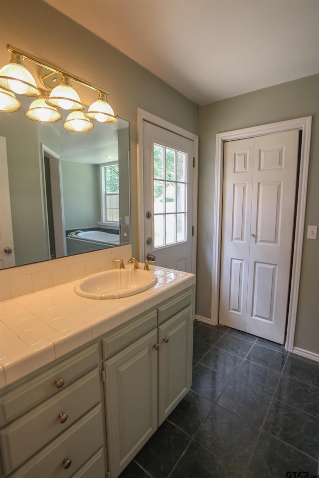21298 Dogwood Dr, Flint, TX 75762 - bathroom with vanity, tile patterned flooring, and baseboards