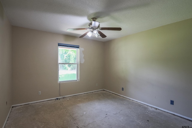 21298 Dogwood Dr, Flint, TX 75762 - unfurnished room featuring baseboards, ceiling fan, and a textured ceiling