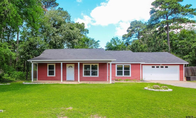 21298 Dogwood Dr, Flint, TX 75762 - ranch-style home with driveway, a garage, and covered porch