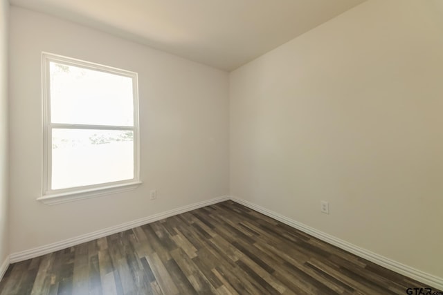 2525 N Tenneha Ave, Tyler, TX 75702 - unfurnished room with dark wood finished floors