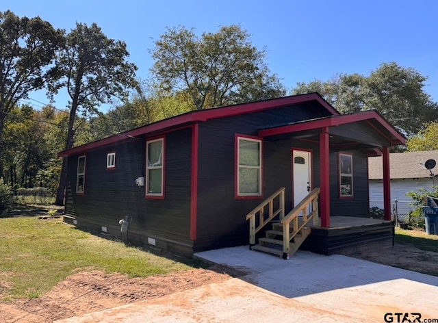 view of front of home featuring covered porch