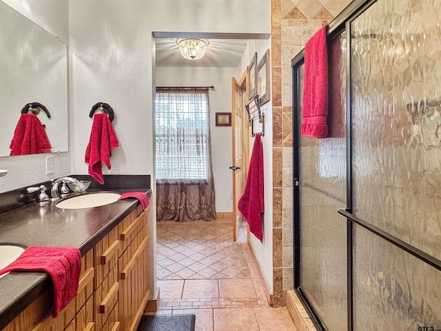 15250 Fm 858, Athens, TX 75752 - bathroom with double vanity, a shower with shower door, and a chandelier