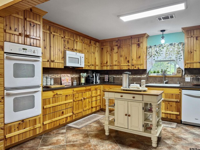15250 Fm 858, Athens, TX 75752 - kitchen featuring white appliances, open shelves, decorative backsplash, a sink, and dark countertops
