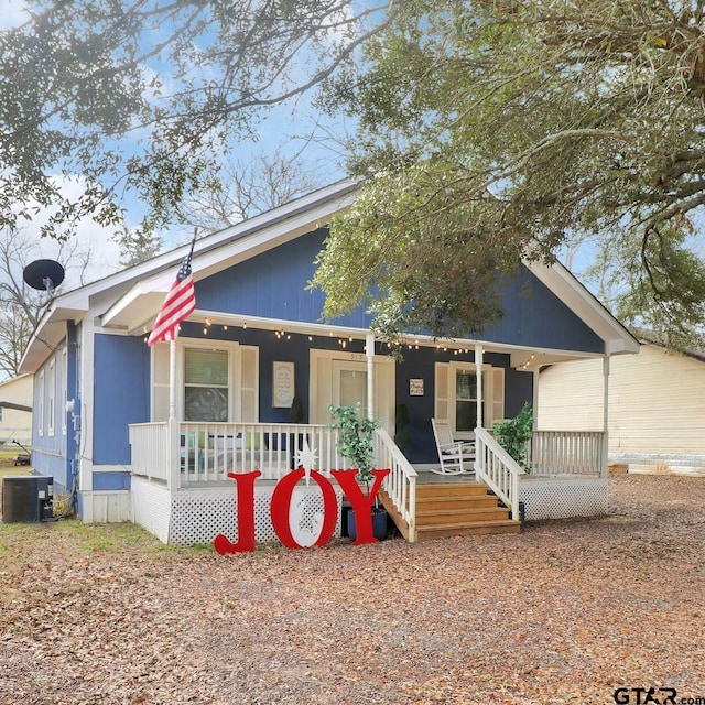 view of front of property featuring covered porch and central air condition unit