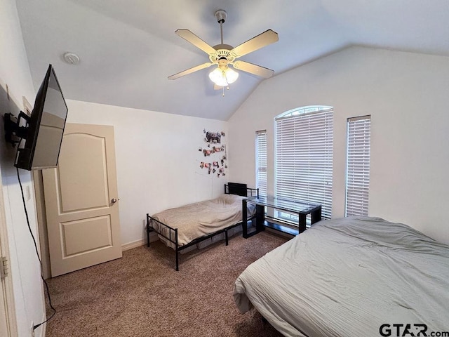 carpeted bedroom featuring a ceiling fan and lofted ceiling