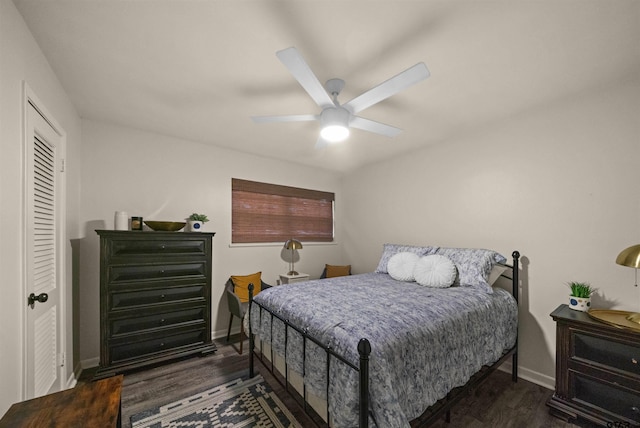 8116 Jewell Ln, Tyler, TX 75703 - bedroom featuring dark wood-style flooring, baseboards, and a ceiling fan
