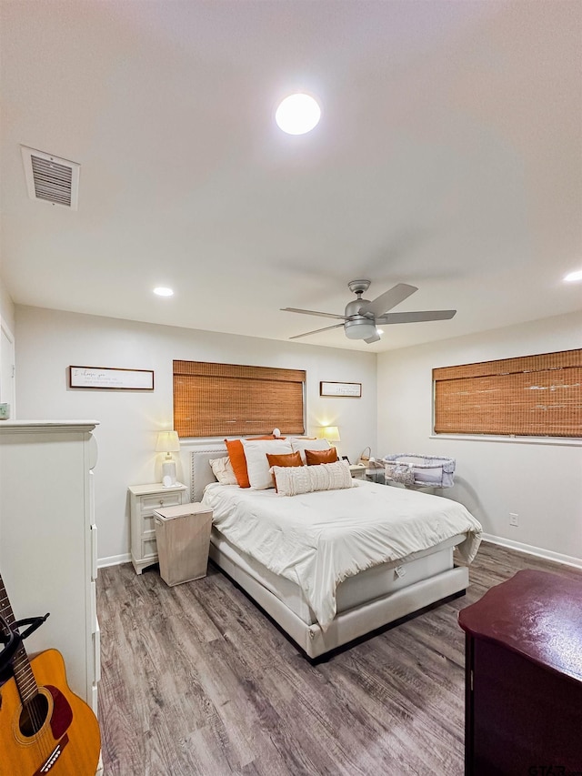 8116 Jewell Ln, Tyler, TX 75703 - bedroom featuring wood finished floors, baseboards, a ceiling fan, and recessed lighting