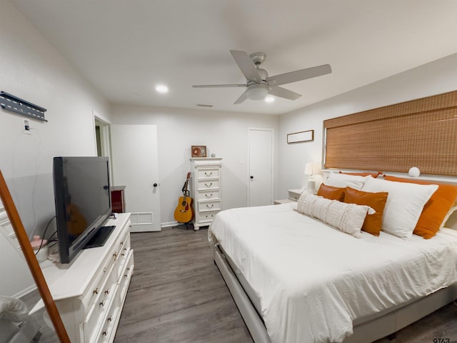 8116 Jewell Ln, Tyler, TX 75703 - bedroom with dark wood-style floors, recessed lighting, a ceiling fan, and baseboards