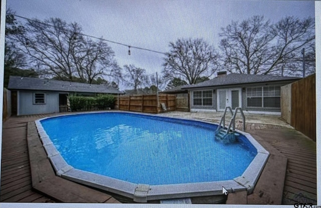 3729 Linda Kaye Dr, Longview, TX 75604 - view of pool featuring a fenced in pool and fence