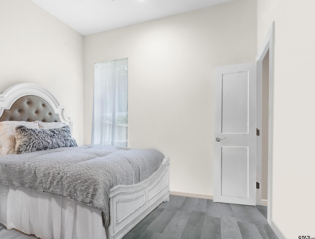 9109 Long Br, Tyler, TX 75703 - bedroom featuring wood finished floors and baseboards