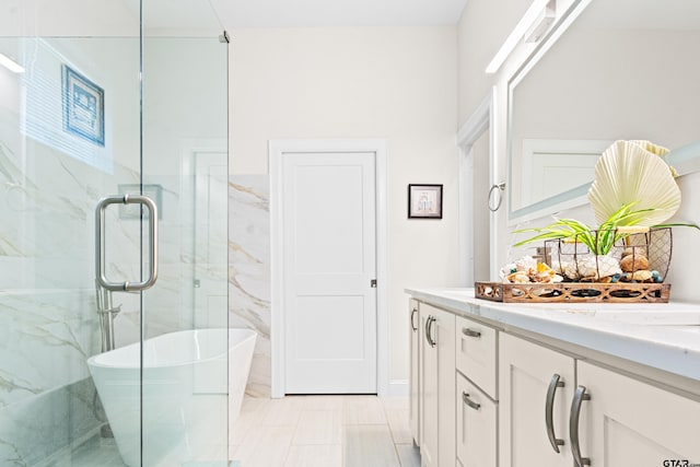 9109 Long Br, Tyler, TX 75703 - full bathroom with vanity, a soaking tub, and a marble finish shower