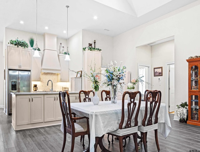 9109 Long Br, Tyler, TX 75703 - dining room with wood finished floors, a high ceiling, and recessed lighting