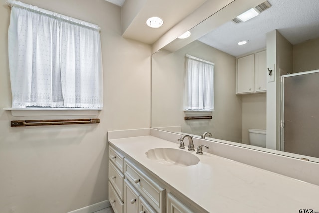725 Purdue Dr, Tyler, TX 75701 - full bath featuring vanity, a shower stall, and recessed lighting