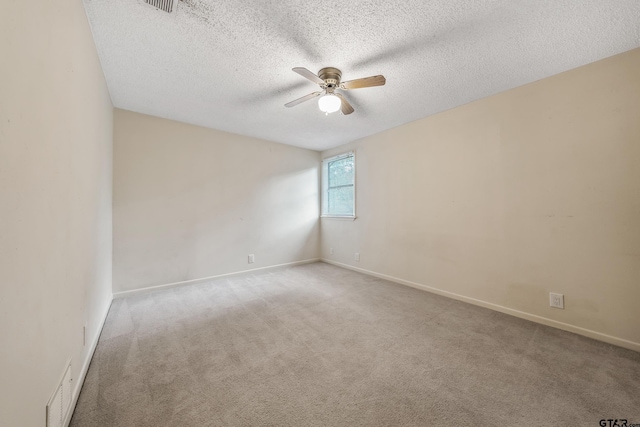 725 Purdue Dr, Tyler, TX 75701 - carpeted spare room with ceiling fan and a textured ceiling