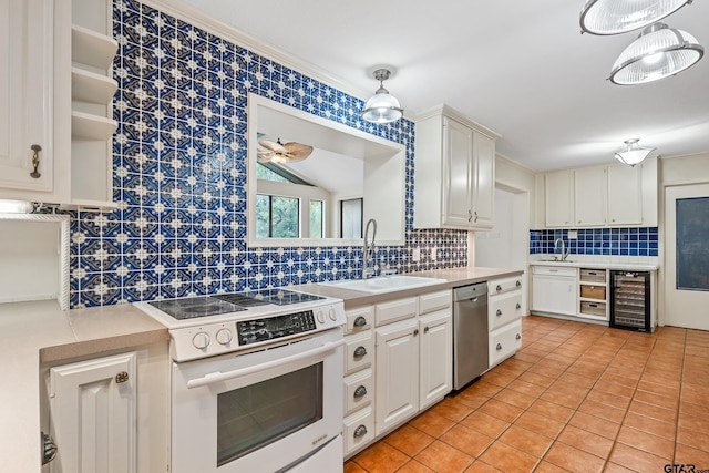 725 Purdue Dr, Tyler, TX 75701 - kitchen featuring white electric range oven, dishwasher, beverage cooler, open shelves, and tasteful backsplash