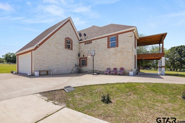 5900 Fm 858, Ben Wheeler, TX 75754 - view of side of property with stone siding, a yard, driveway, and a shingled roof