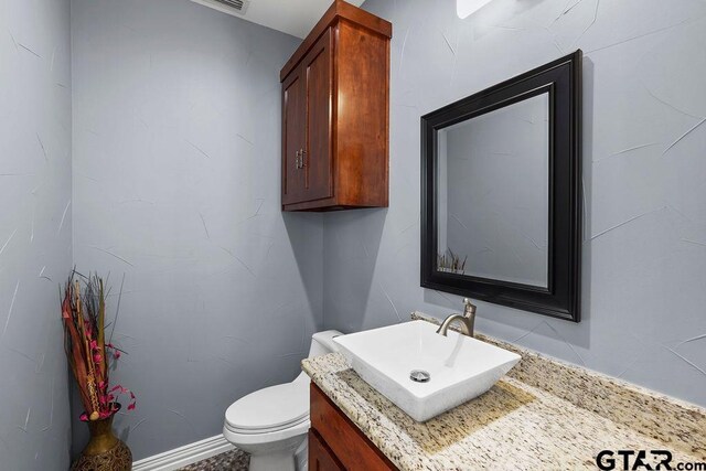 5900 Fm 858, Ben Wheeler, TX 75754 - bathroom with toilet and vanity
