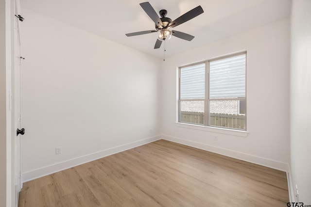 empty room with light hardwood / wood-style floors and ceiling fan