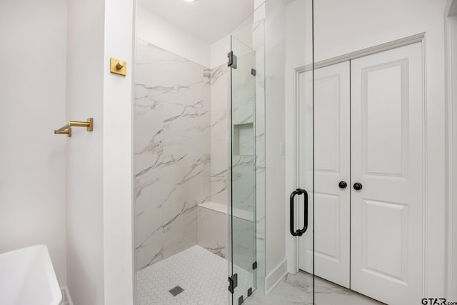 bathroom with an enclosed shower