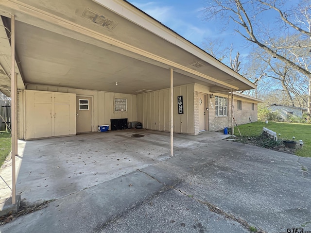 exterior space featuring a carport