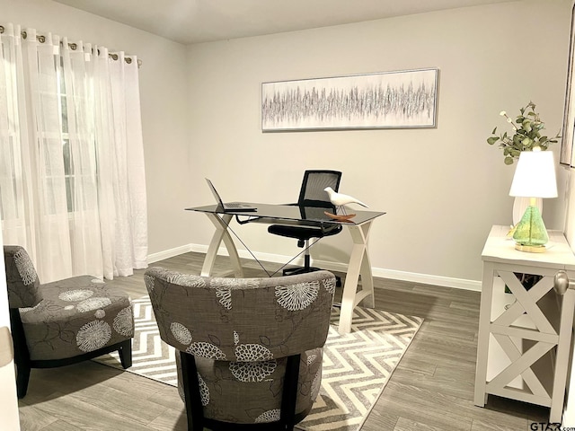 202 Parker Oaks, Chandler, TX 75758 - office area with wood finished floors and baseboards