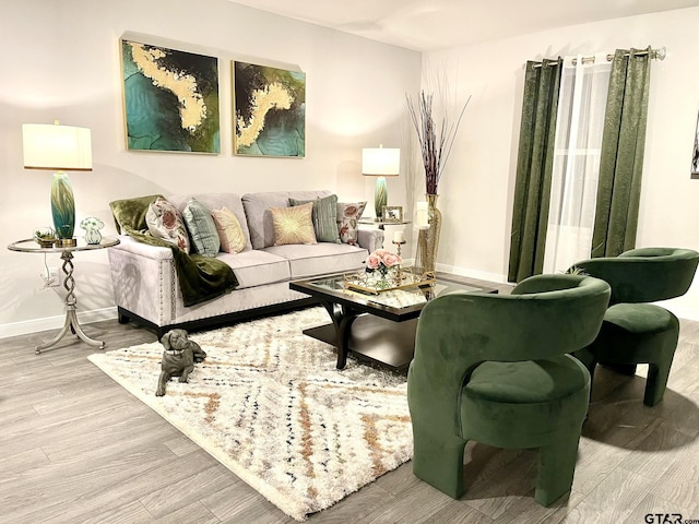 202 Parker Oaks, Chandler, TX 75758 - living area featuring wood finished floors and baseboards
