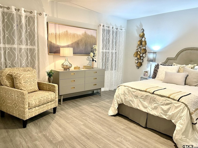 202 Parker Oaks, Chandler, TX 75758 - bedroom with light wood finished floors