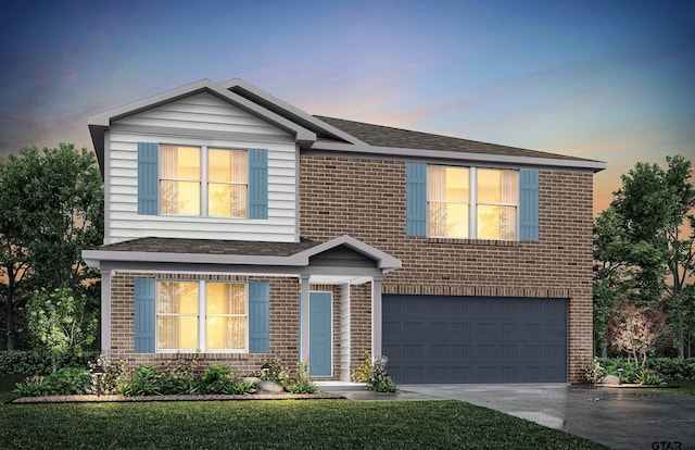 202 Parker Oaks, Chandler, TX 75758 - view of front of property with a garage, brick siding, concrete driveway, and a yard