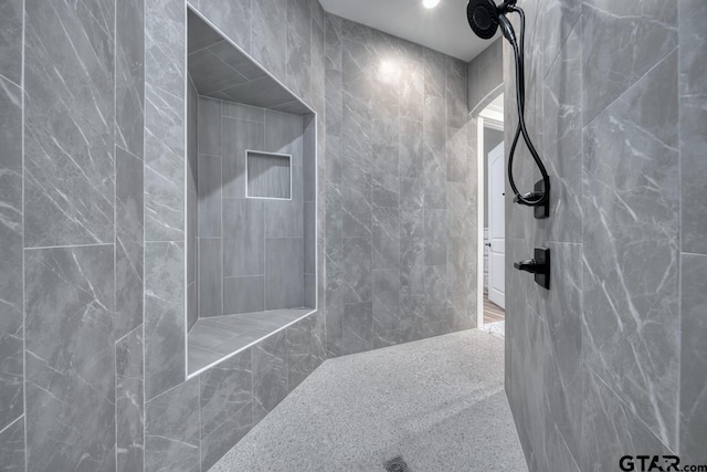 93 S Ryder Cup, Hideaway, TX 75771 - bathroom with tile walls and a tile shower
