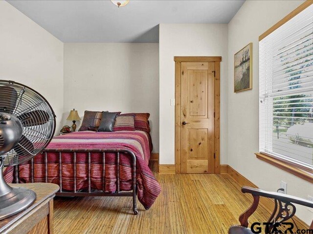 bedroom featuring hardwood / wood-style floors