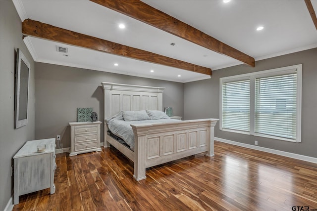 bedroom featuring baseboards, visible vents, beam ceiling, and dark wood-style flooring