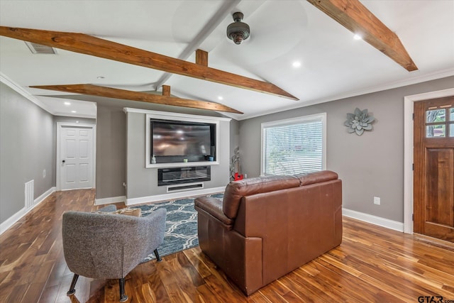 living area featuring vaulted ceiling with beams, visible vents, baseboards, recessed lighting, and wood finished floors