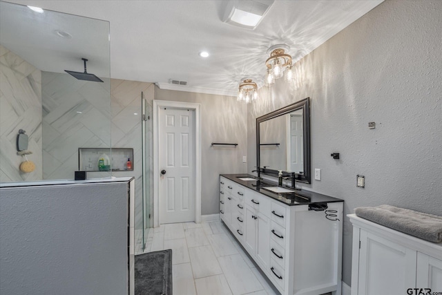 full bath featuring a chandelier, a sink, visible vents, and a stall shower
