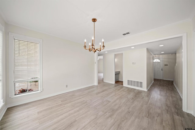 2110 Macbeth Ct, Tyler, TX 75703 - interior space featuring an inviting chandelier, baseboards, light wood-style flooring, and visible vents