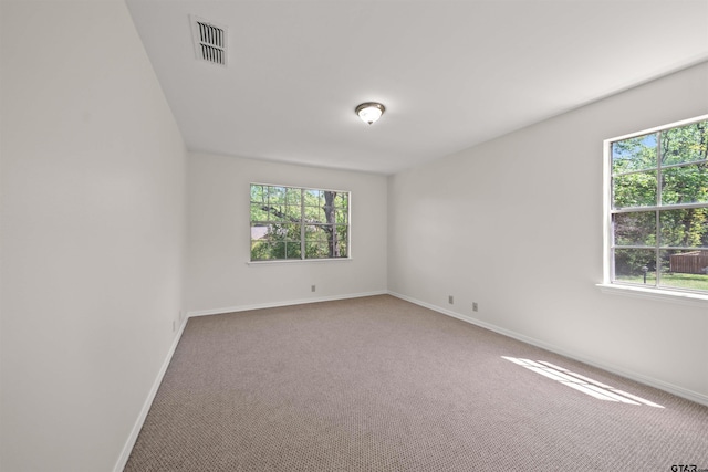 2110 Macbeth Ct, Tyler, TX 75703 - carpeted spare room with baseboards and visible vents