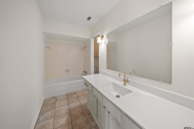 2110 Macbeth Ct, Tyler, TX 75703 - full bathroom with stone finish flooring, visible vents, vanity, baseboards, and shower / bathtub combination