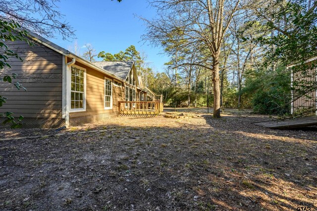 153 Candlelight Cv, Holly Lake Ranch, TX 75765 - view of yard with a deck