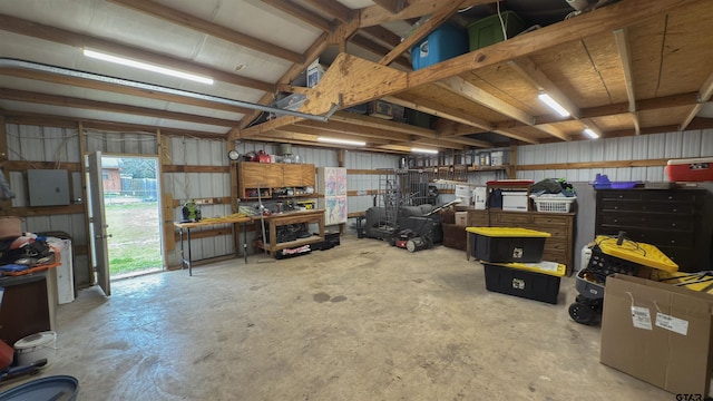 garage with a workshop area