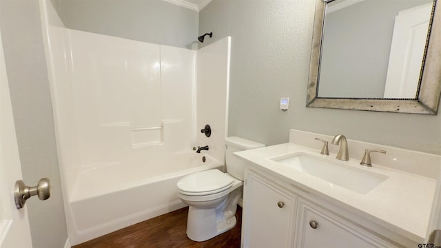 full bathroom with vanity, wood-type flooring, bathing tub / shower combination, and toilet