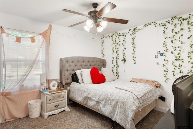 bedroom featuring ceiling fan and carpet floors