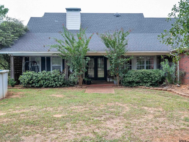 view of front of home featuring a front lawn