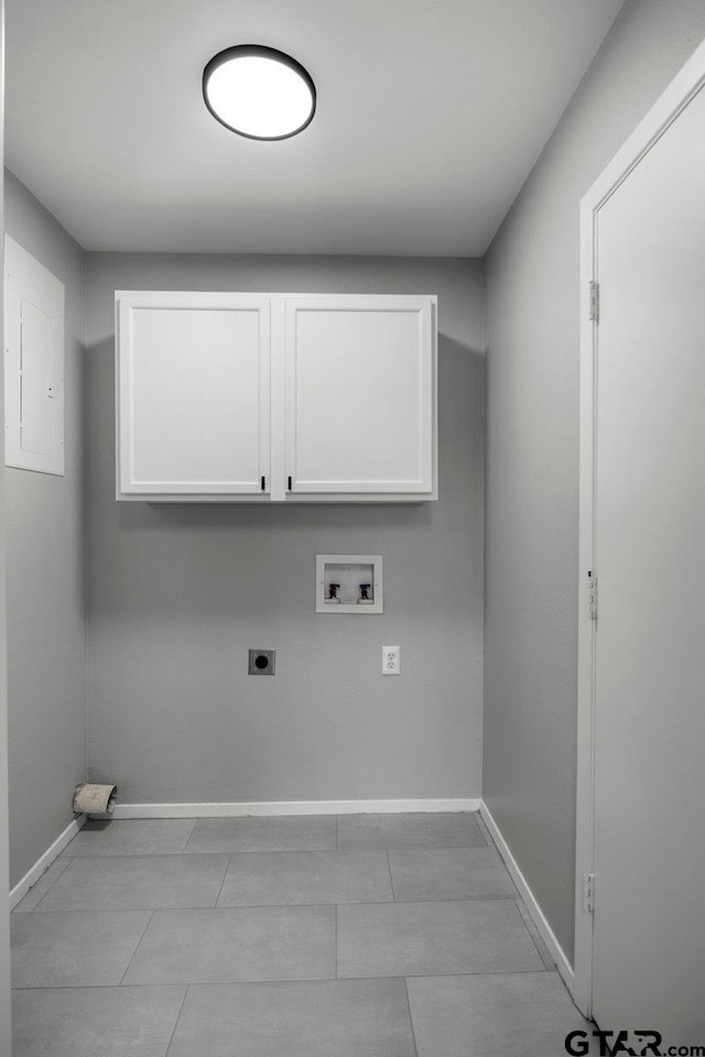 laundry area with cabinet space, electric panel, baseboards, hookup for an electric dryer, and washer hookup