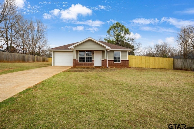 view of front of home featuring driveway, a front yard, a garage, and brick siding