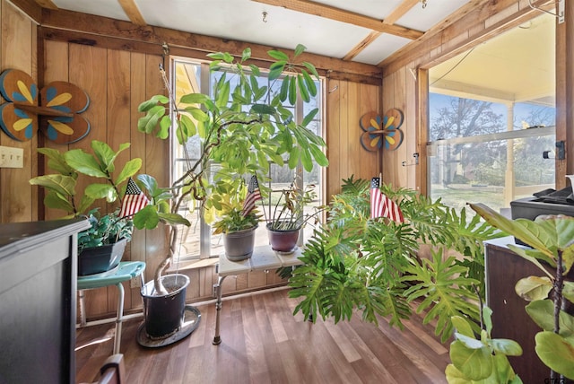 sunroom with beam ceiling