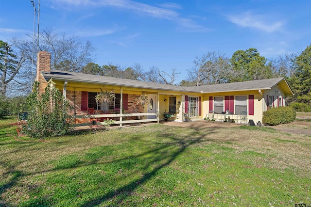 ranch-style house with a front yard